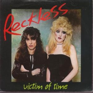 RECKLESS: Victim of Time 7" Hot and sexy Hard Rock female singer, great band a la Girlschool, Helix, King Kobra- Check video