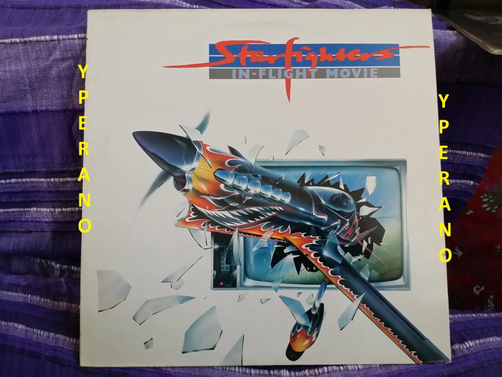 STARFIGHTERS: In Flight movie LP. Mint vinyl. Hard Rock AC/DC type w. members of the Young family. Check audio