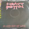 HEAVY PETTIN: In and out of Love 12" produced by Brian May + live @ Rock Show, BBC Radio 1. Check videos 1983