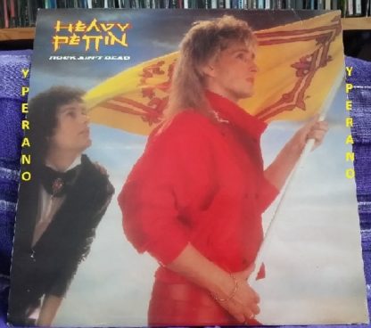 HEAVY PETTIN: Rock Ain't Dead LP + inner. 1985 NWOBHM masterpiece. Vinyl in VG+ condition, original UK.
