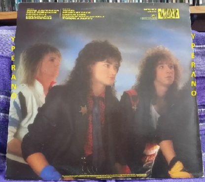 HEAVY PETTIN: Rock Ain't Dead LP + inner. 1985 NWOBHM masterpiece. Vinyl in VG+ condition, original UK.