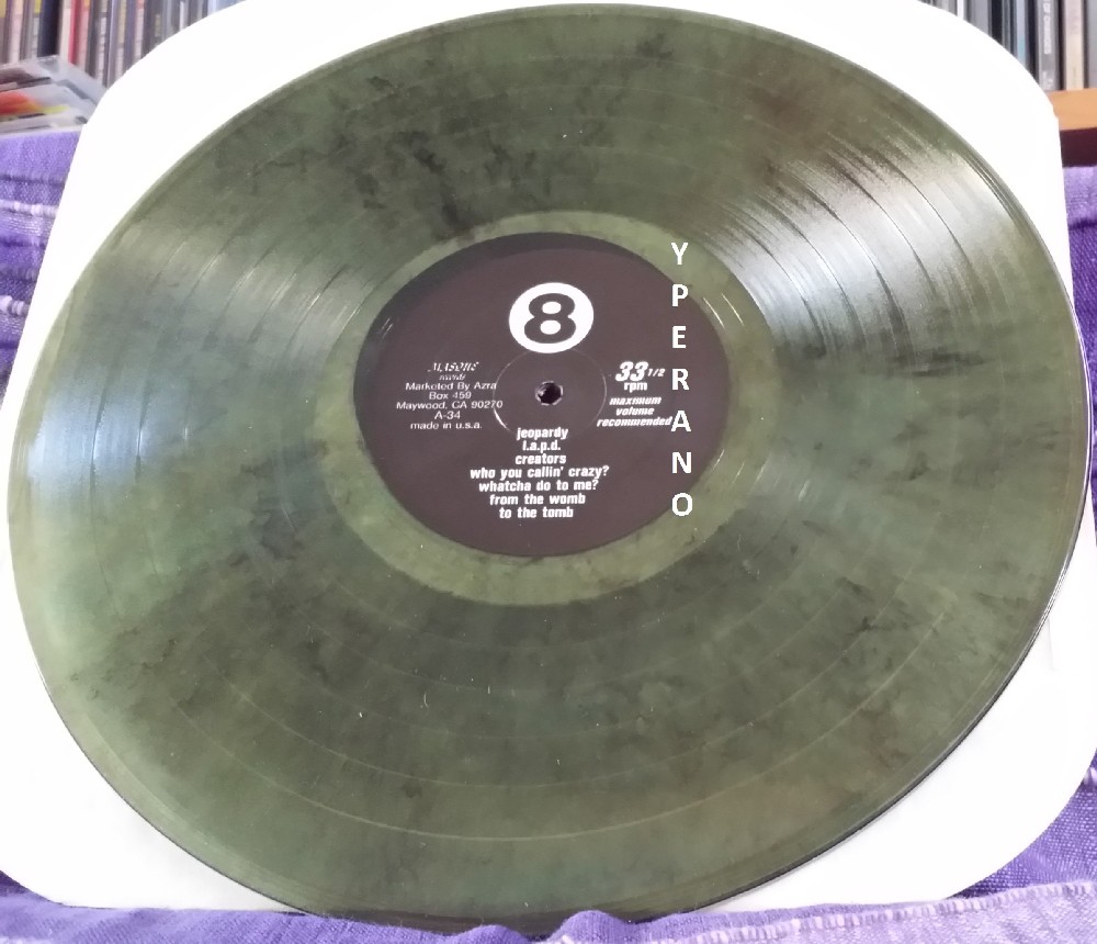 MORTIS: Is Nothing Sacred? LP Splatter Green vinyl. Punk rock